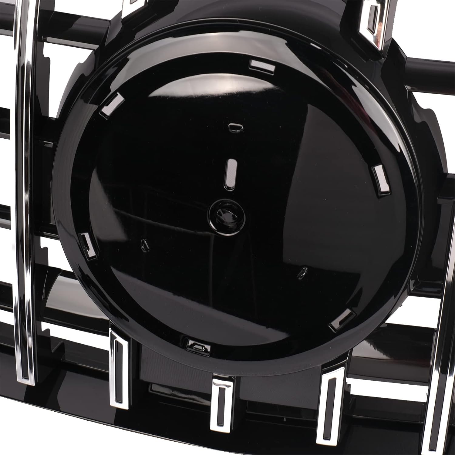 Close-up view of the central emblem area of the grille