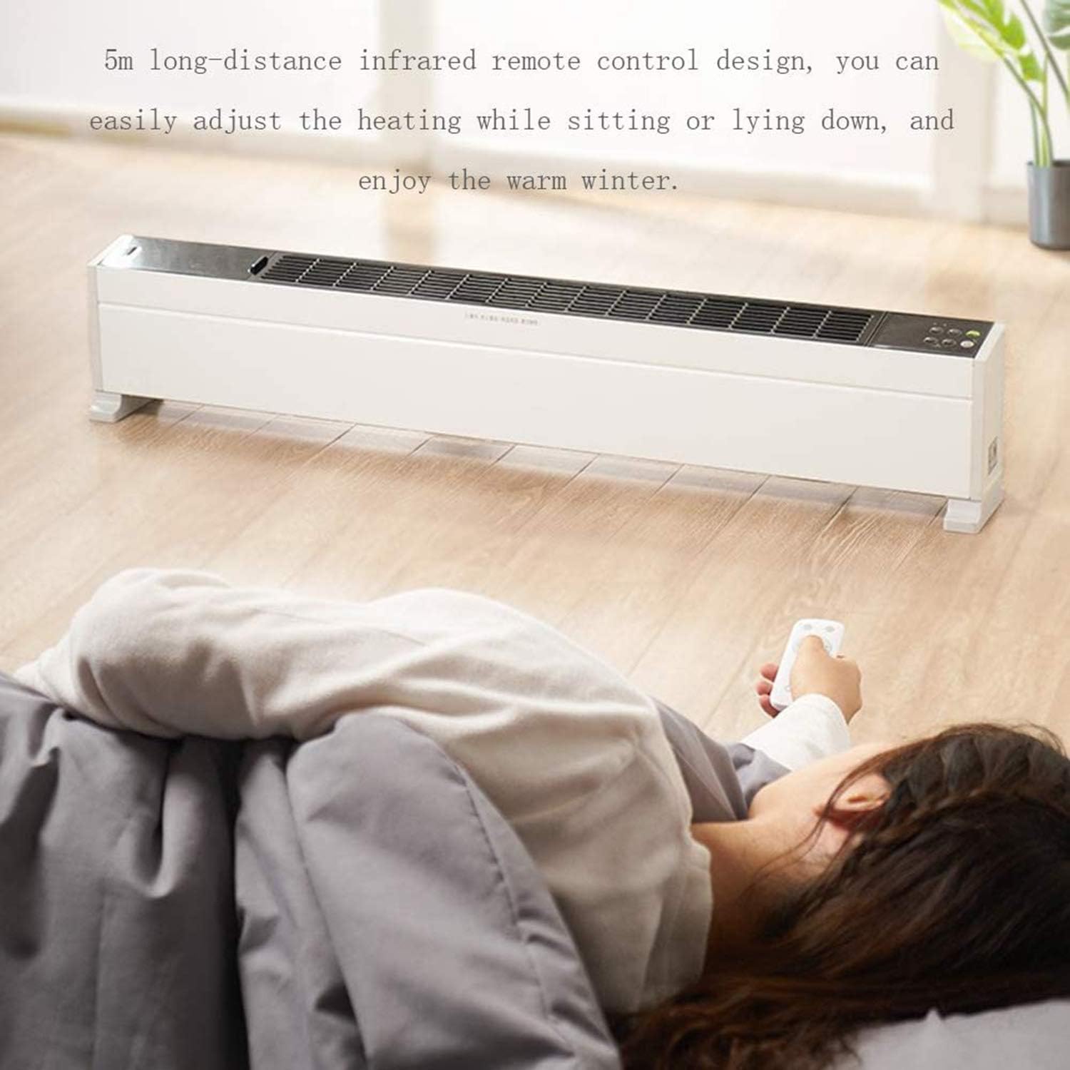 Person using remote control for heater