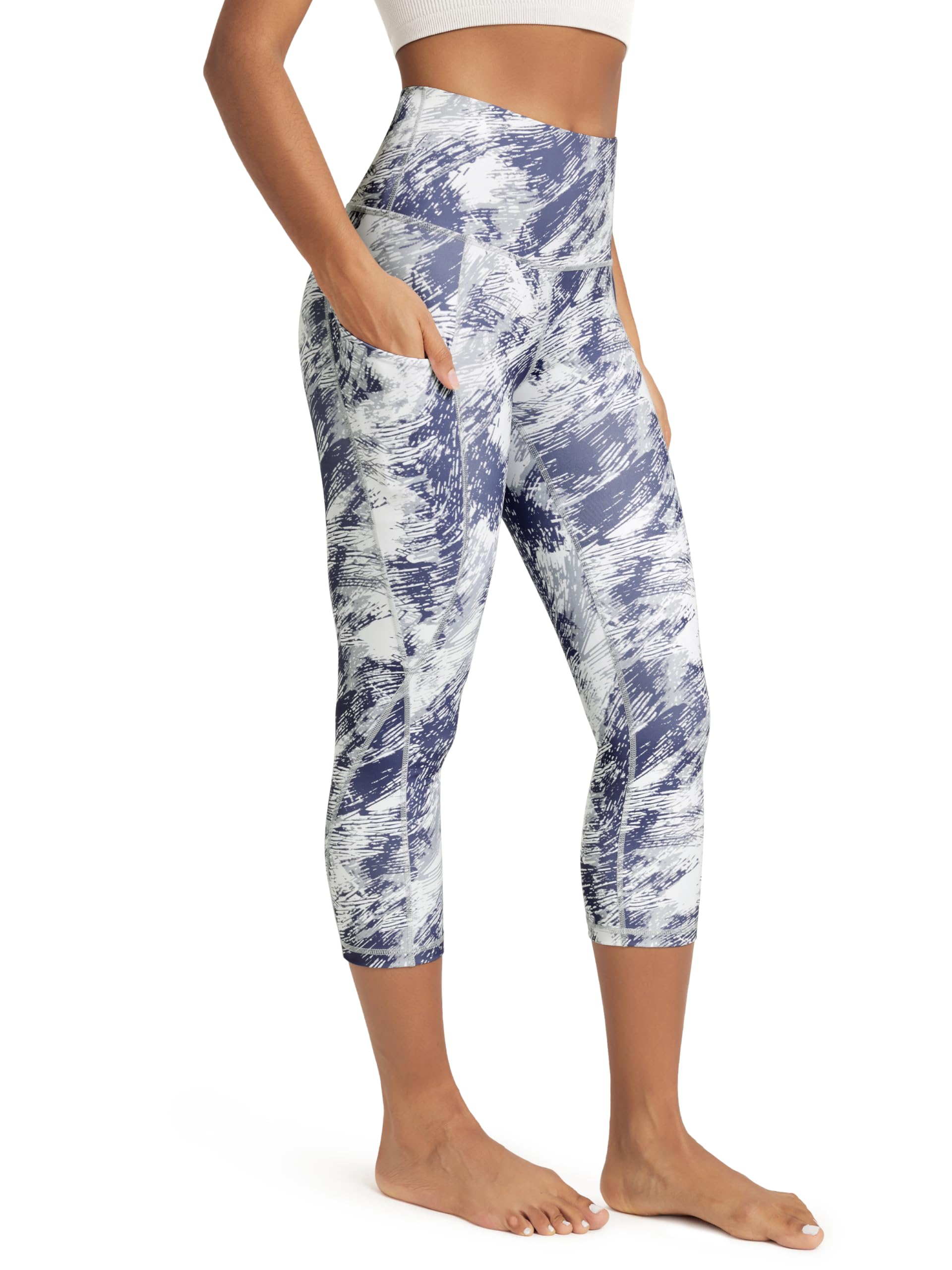 ODODOS Women's High Waisted Yoga Capris with Pockets, Tummy Control Non See Through Workout Athletic Running Capri Leggings