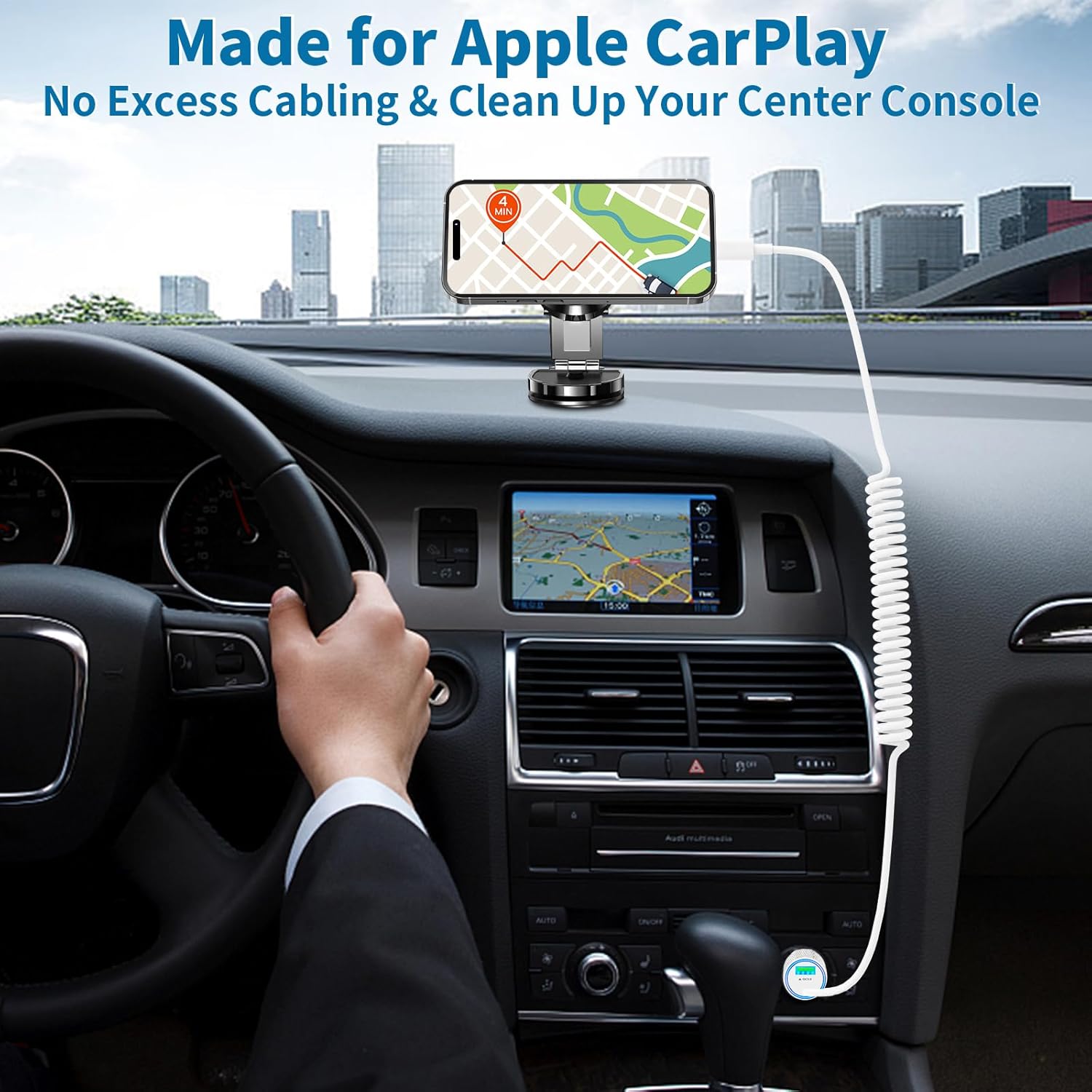 Car charger installed in vehicle, showing coiled cable reaching phone