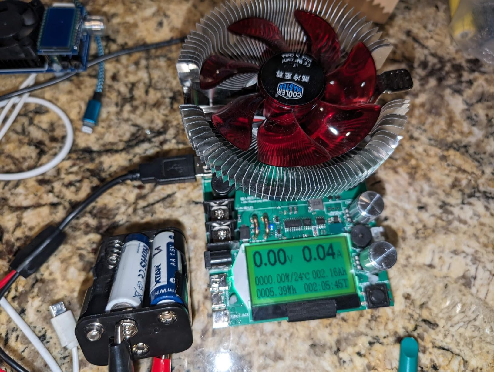 Ok output capacity, built in charger, cannot be USB charged while in use, no low voltage warning