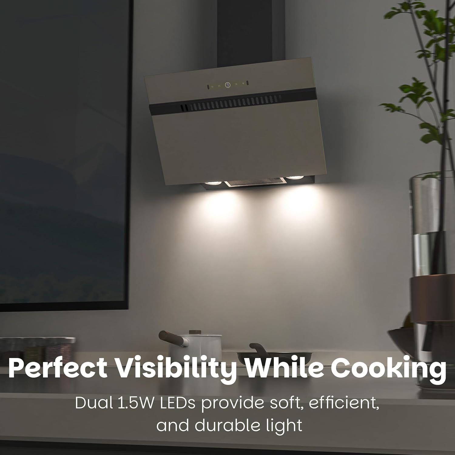 The extractor hood's LED lights illuminating a cooking area, with text 'Perfect Visibility While Cooking'.
