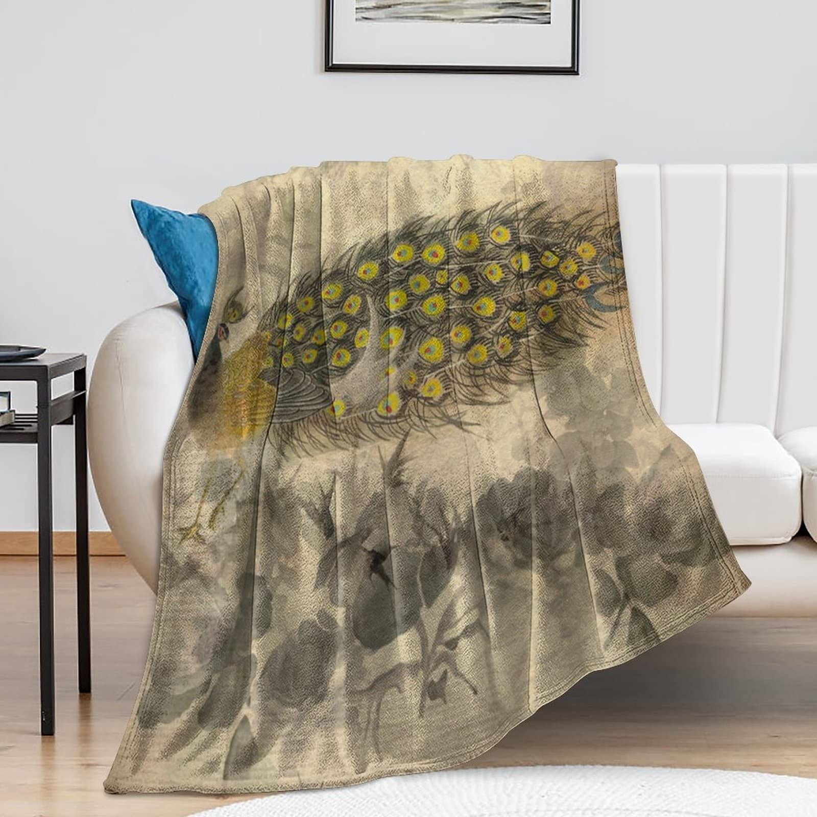 Couverture de voyage motif paon : le cadeau de pendaison de crémaillère idéal