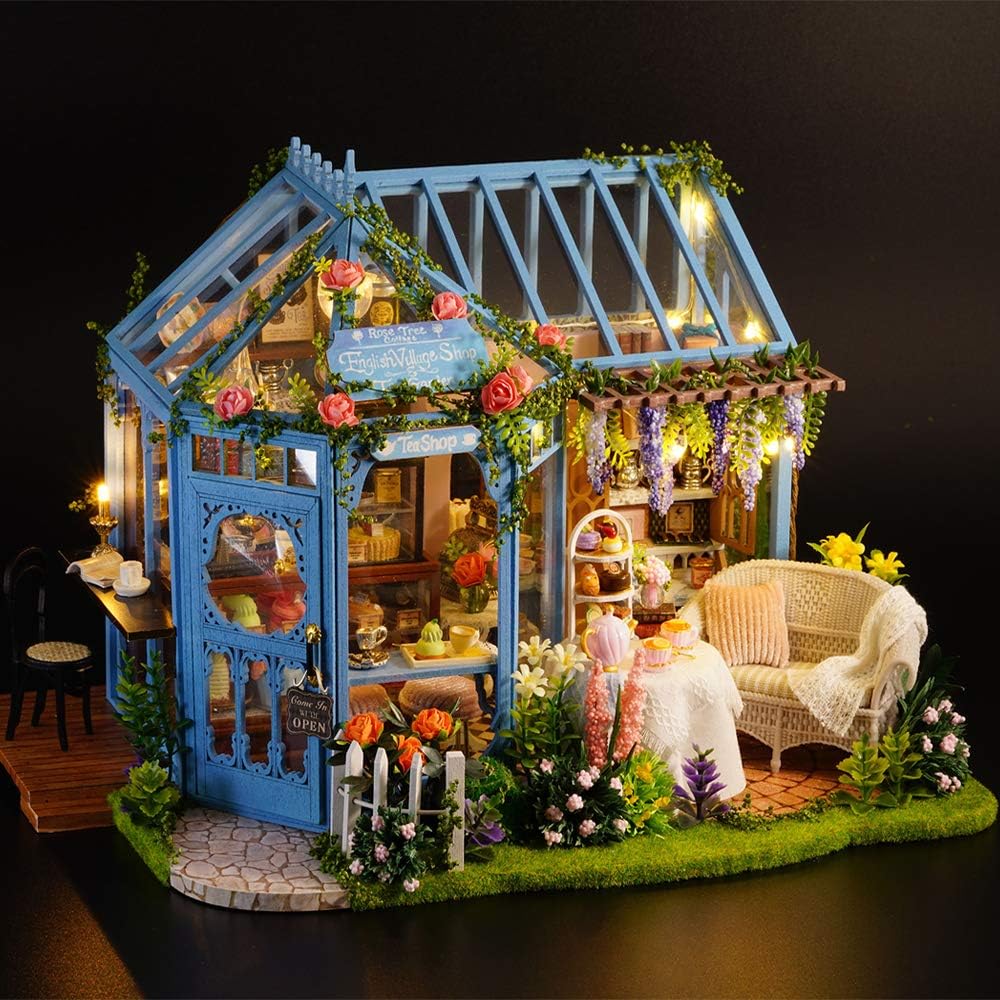TuKIIE Rose Garden Tea House miniature dollhouse illuminated at night