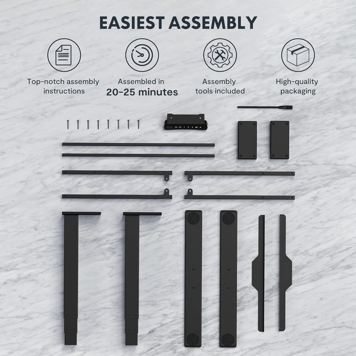 Components of the FLEXISPOT EC5 Standing Desk laid out for assembly, including legs, frame, control panel, and screws.