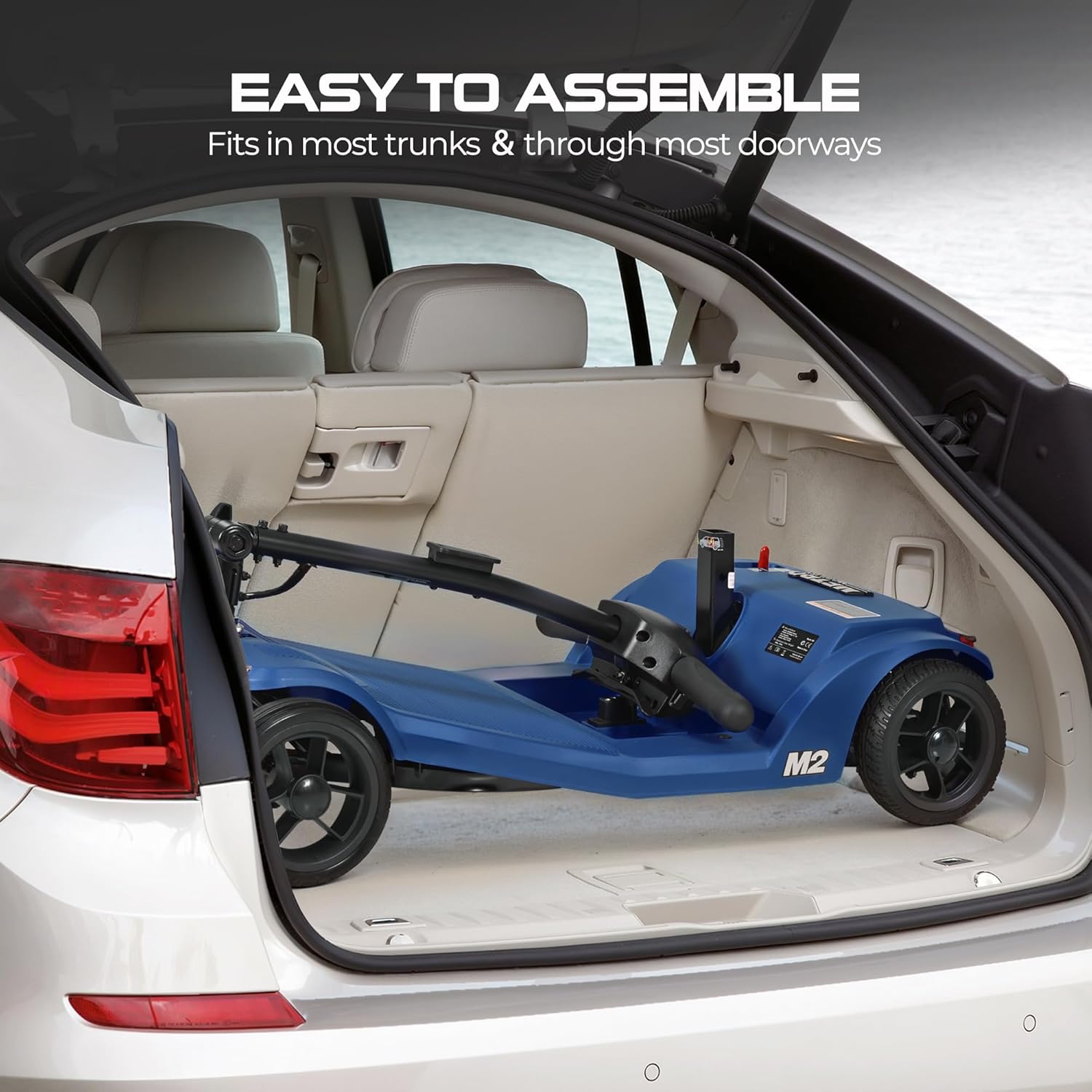 Scooter folded in car trunk
