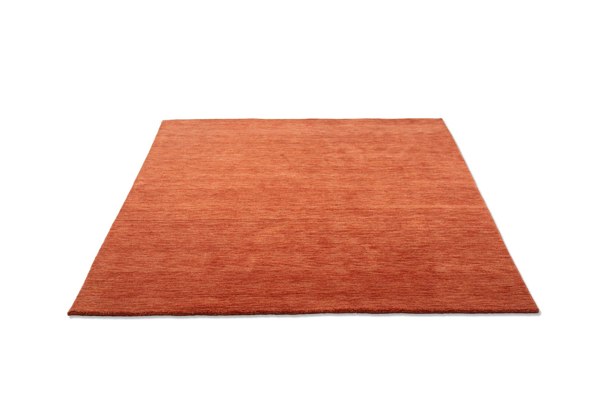 THEKO | Teppich Holi aus 100% Schurwolle | schlicht, zeitlos + modern | handgewebt | Farbe: Terrakotta | 40x60 cm