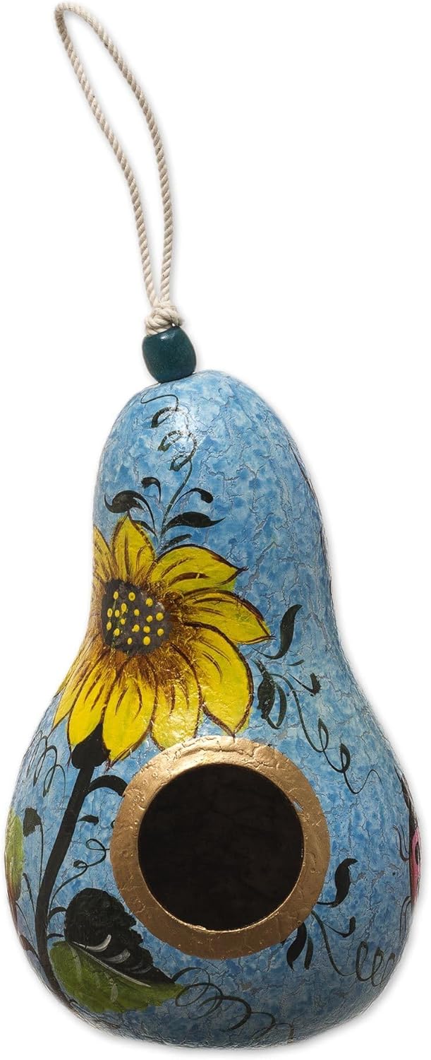 A beautiful, hand-painted gourd birdhouse.