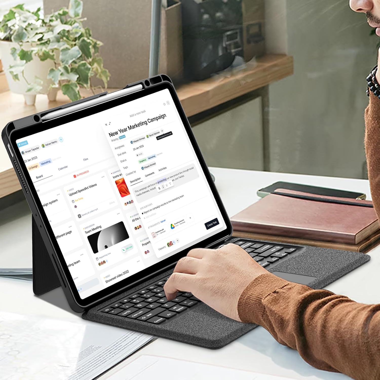 User typing on keyboard case