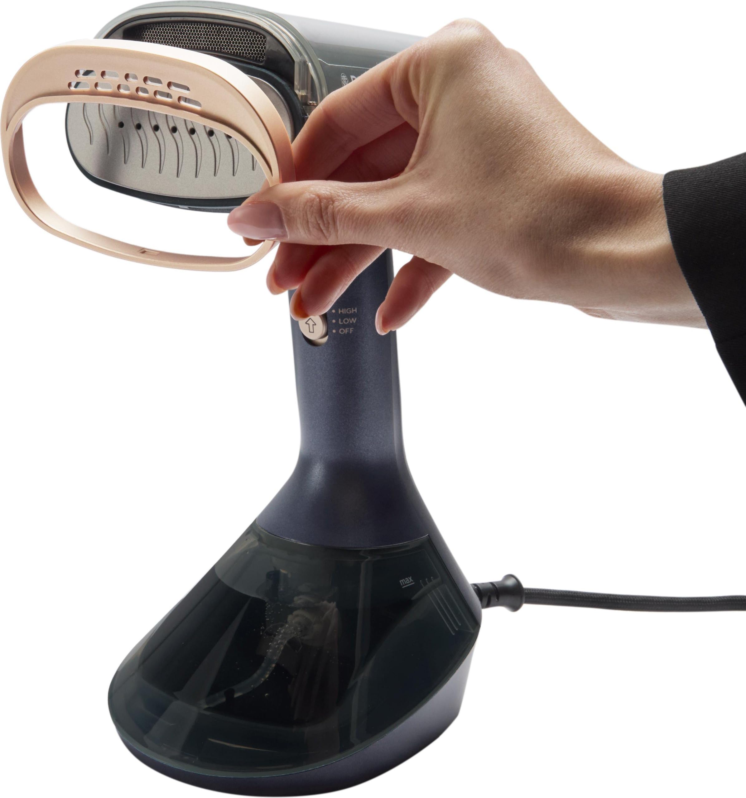 Russell Hobbs Vapore per indumenti a vapore Genie VacuSteam, 23 g/min vapore, 7 minuti di funzionamento, riscaldamento 40 secondi, stiratura efficiente e potenza di aspirazione
