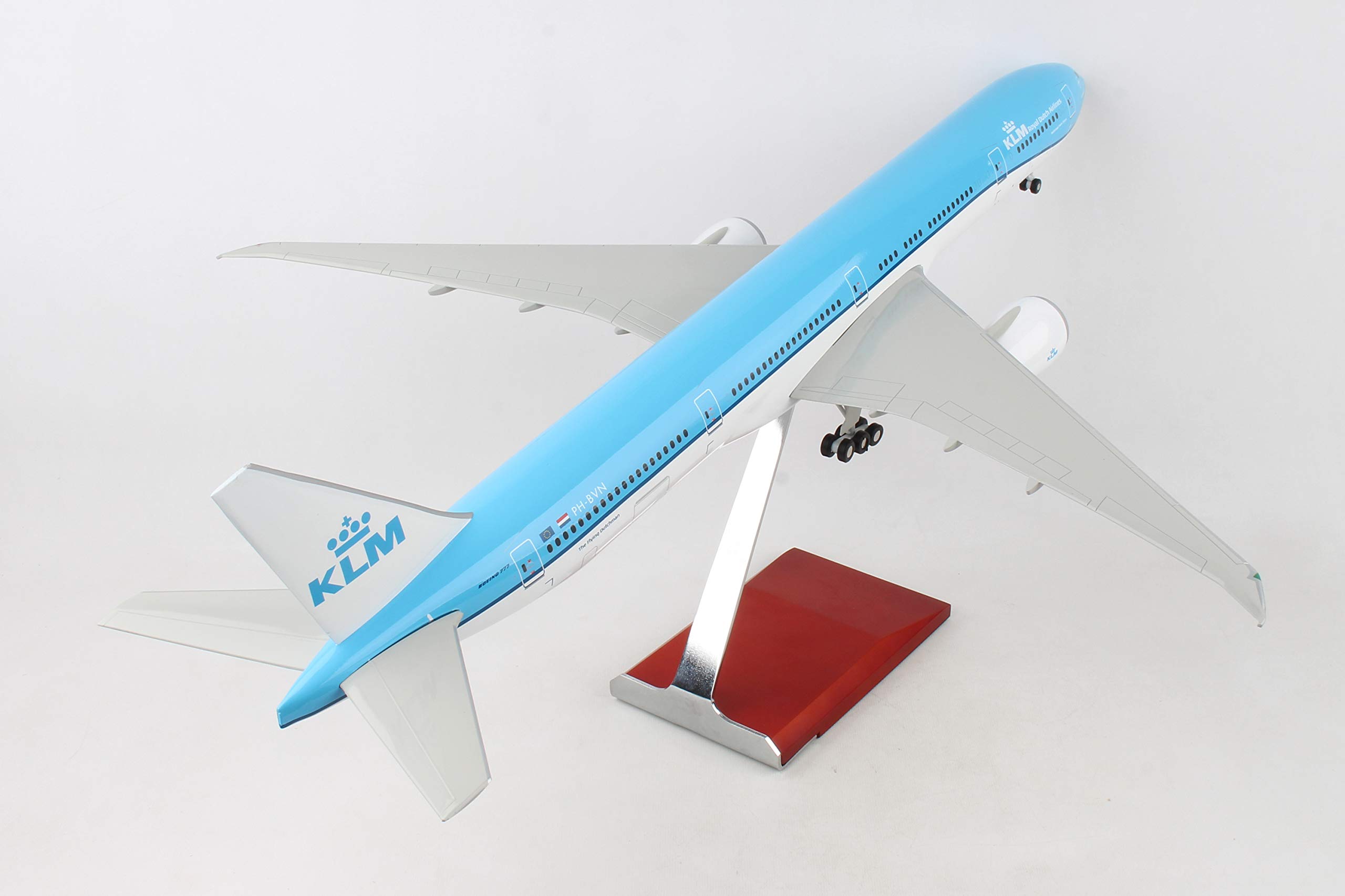 Amazon.com: Daron Skymarks KLM 777-300 1/100 with Wood Stand