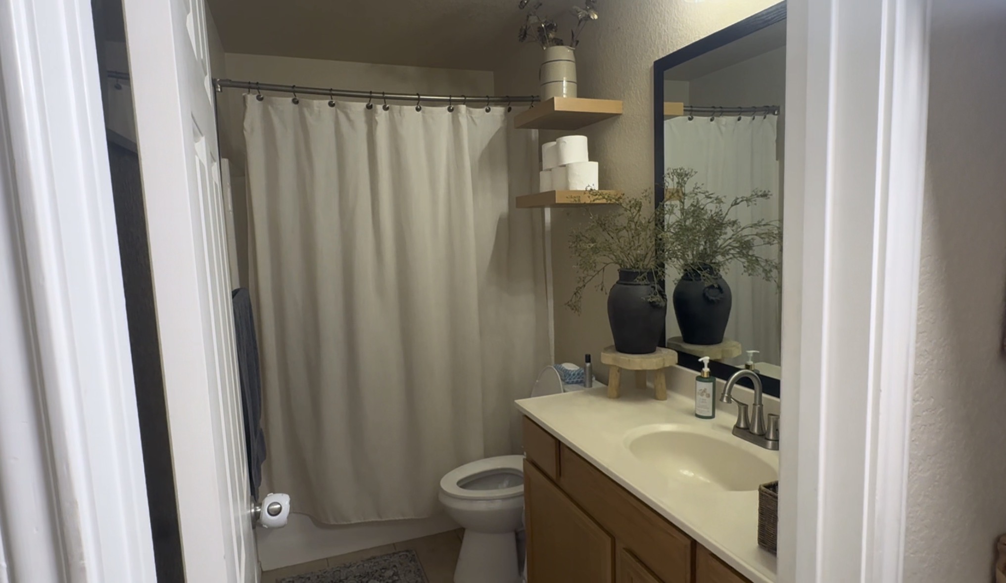 Affordable and easy bathroom upgrade! Floating shelves are perfect for all your products!