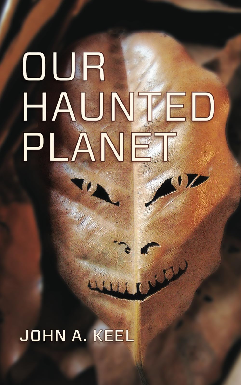 Our Haunted Planet (Revised): Mass Market Paperback