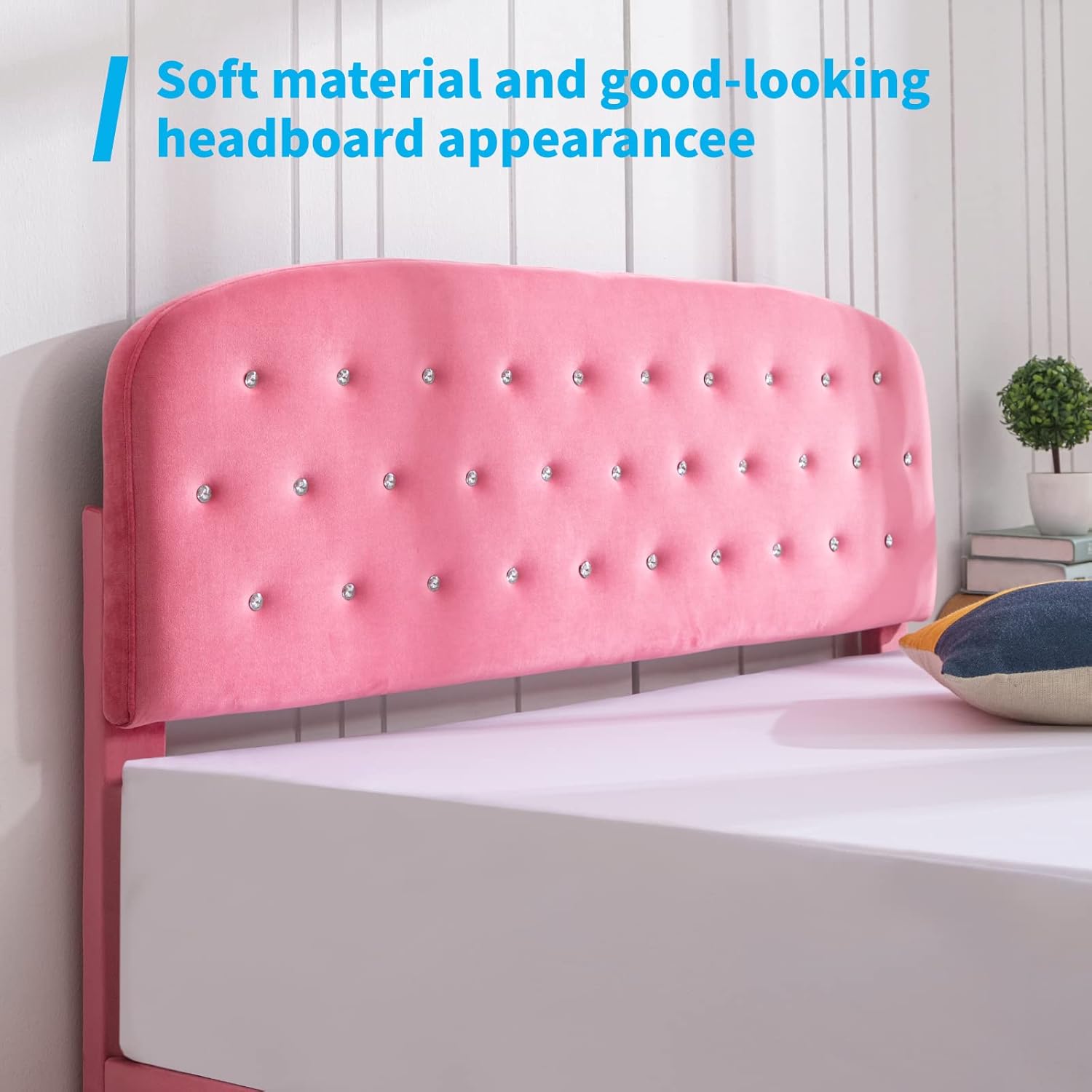 Close-up of the upholstered headboard with diamond accents