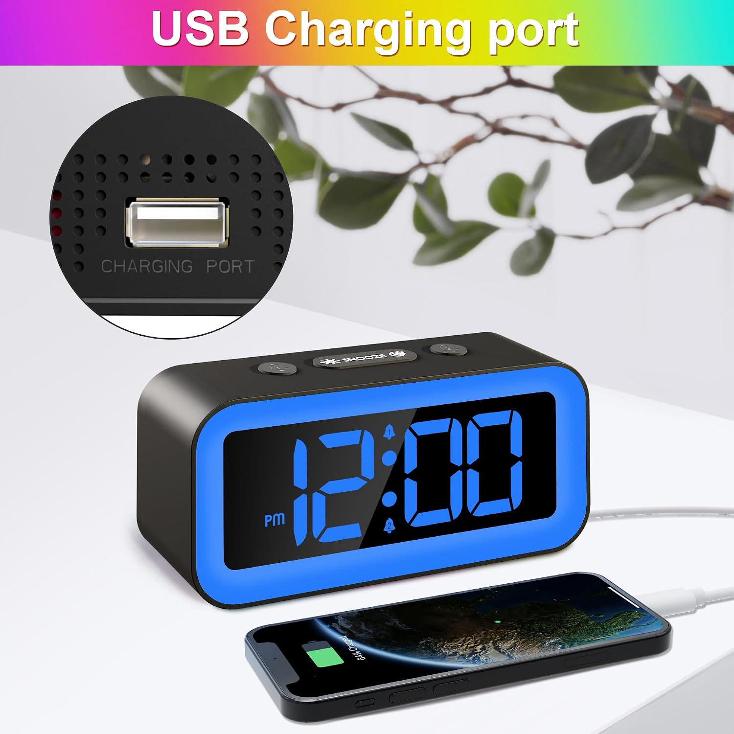 JALL GA-2 Digital Alarm Clock showing the USB charging port on the back, with a smartphone connected for charging.