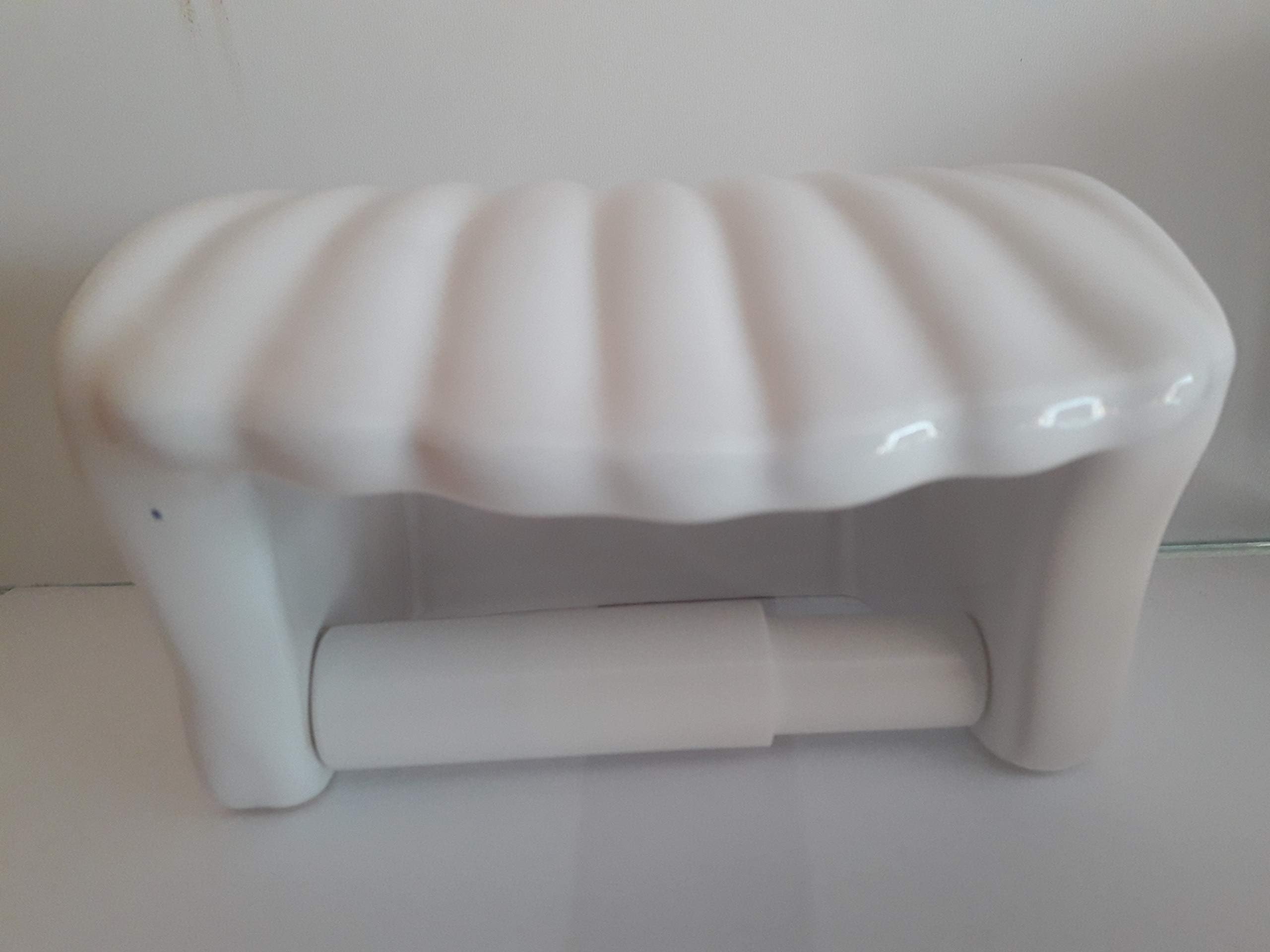 Wiegand Ceramic toilet paper holder in the shape of a shell design, white.