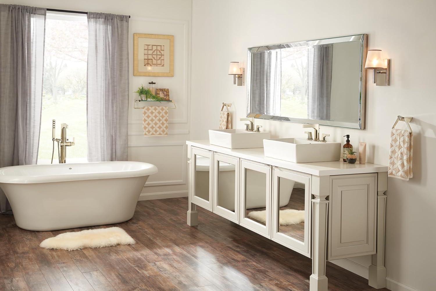 Delta Faucet Zura Floor Mount Tub Filler installed next to a freestanding bathtub in a modern bathroom