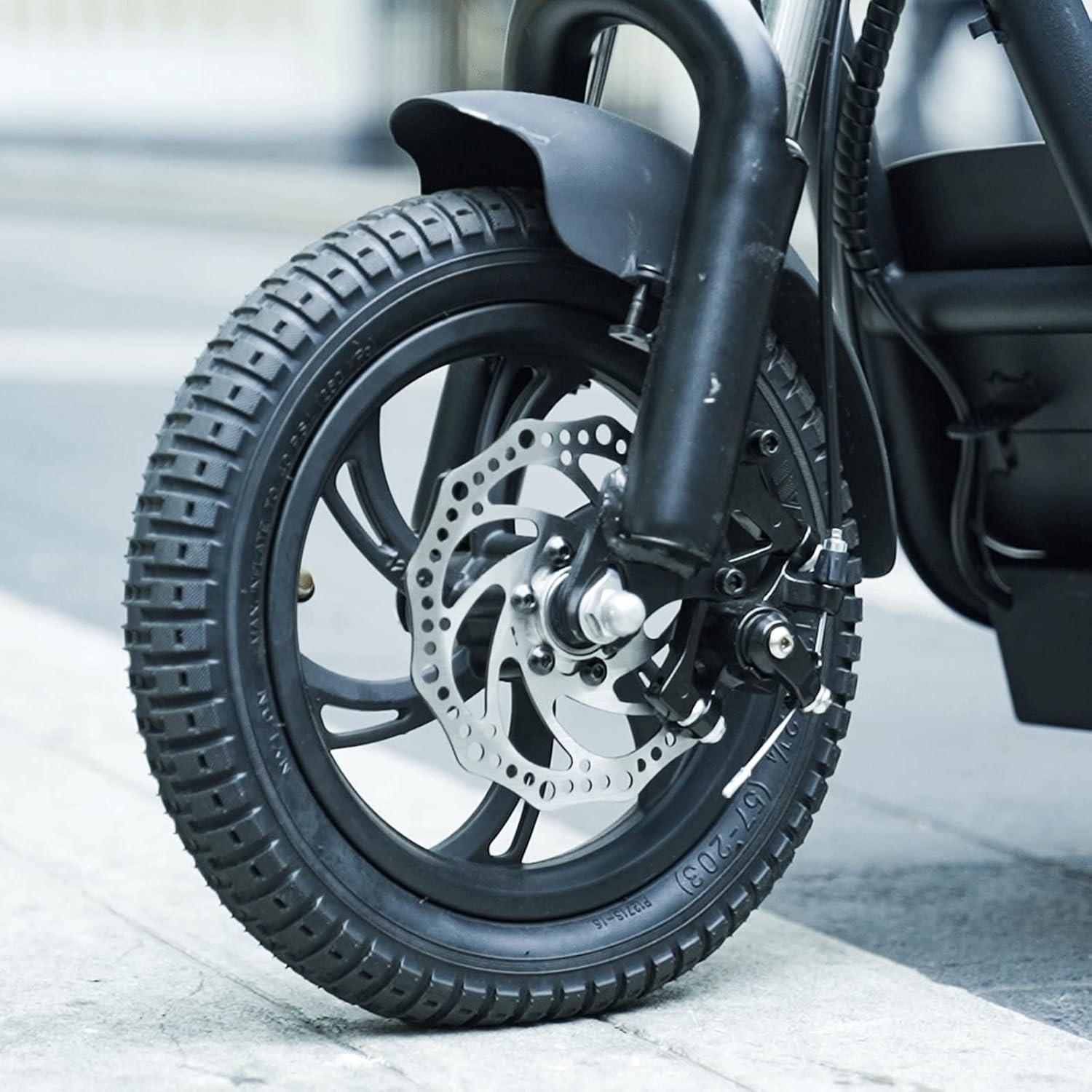 Close-up of the front wheel and disc brake