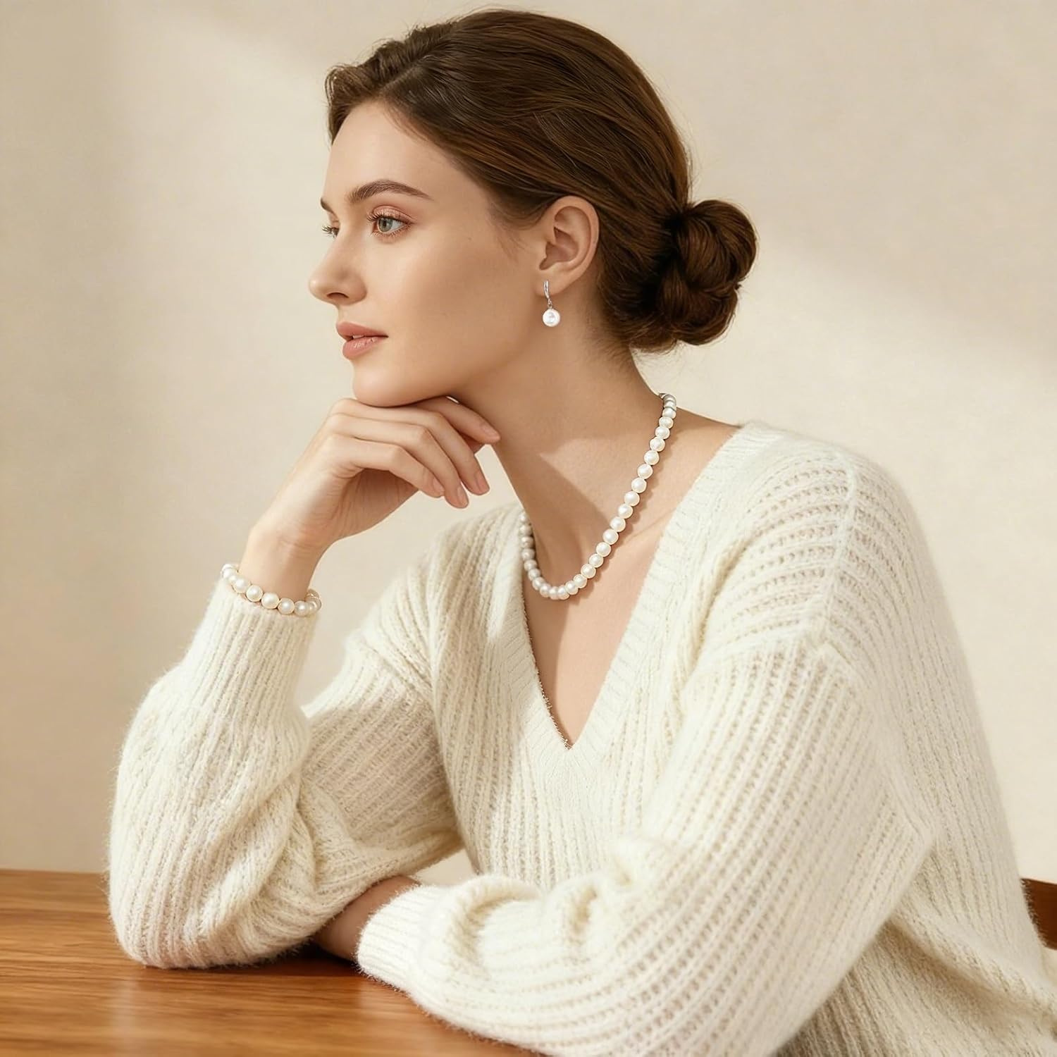 Pearl Necklace Set, featuring an exquisite bracelet, stud earrings, and necklace. This pearl necklace, bracelet, and ring ensemble radiates elegant charm, effortlessly elevating the sophistication of everyday attire. Perfect for weddings, banquets, or birthday celebrations, it also makes a thoughtful gift for women
