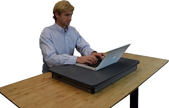 Uncaged Ergonomics Small Standing Desk Converter & Desk Riser (2 Pack) | Stand up desk riser with a 27.5x19.5 top panel. Squeeze a lever and the spring-assisted lift locks at 4 heights from 3-14.