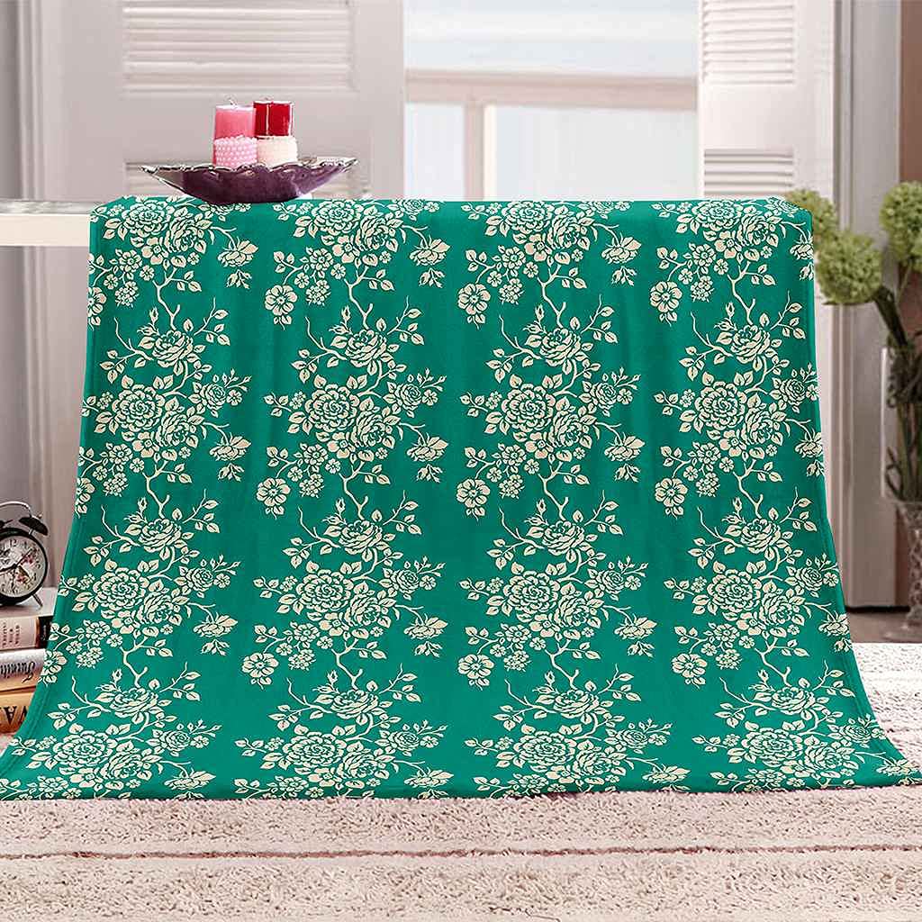 Couverture polaire flanelle fleur verte : fini le froid avec ce plaid chaud et doux