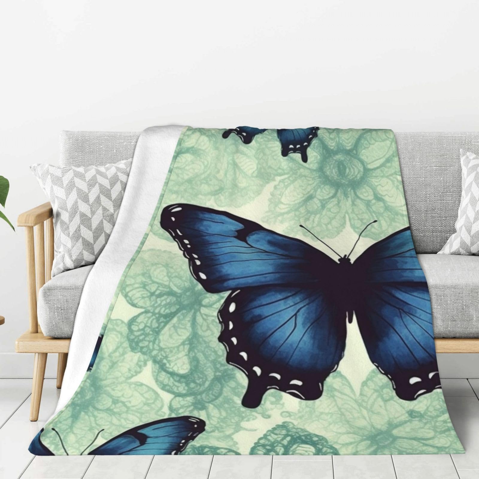 Couverture flanelle légère papillon bleu idéale pour vos soirées cocooning et voyages