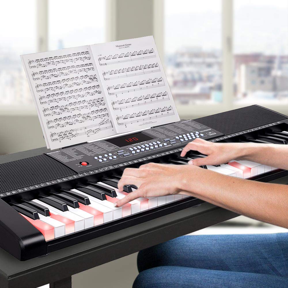 Bakaji Teclado musical plano electrónico, 61 teclas multifunción con 255 ritmos, 50 canciones preestablecidas, entrada AUX y soporte para partituras