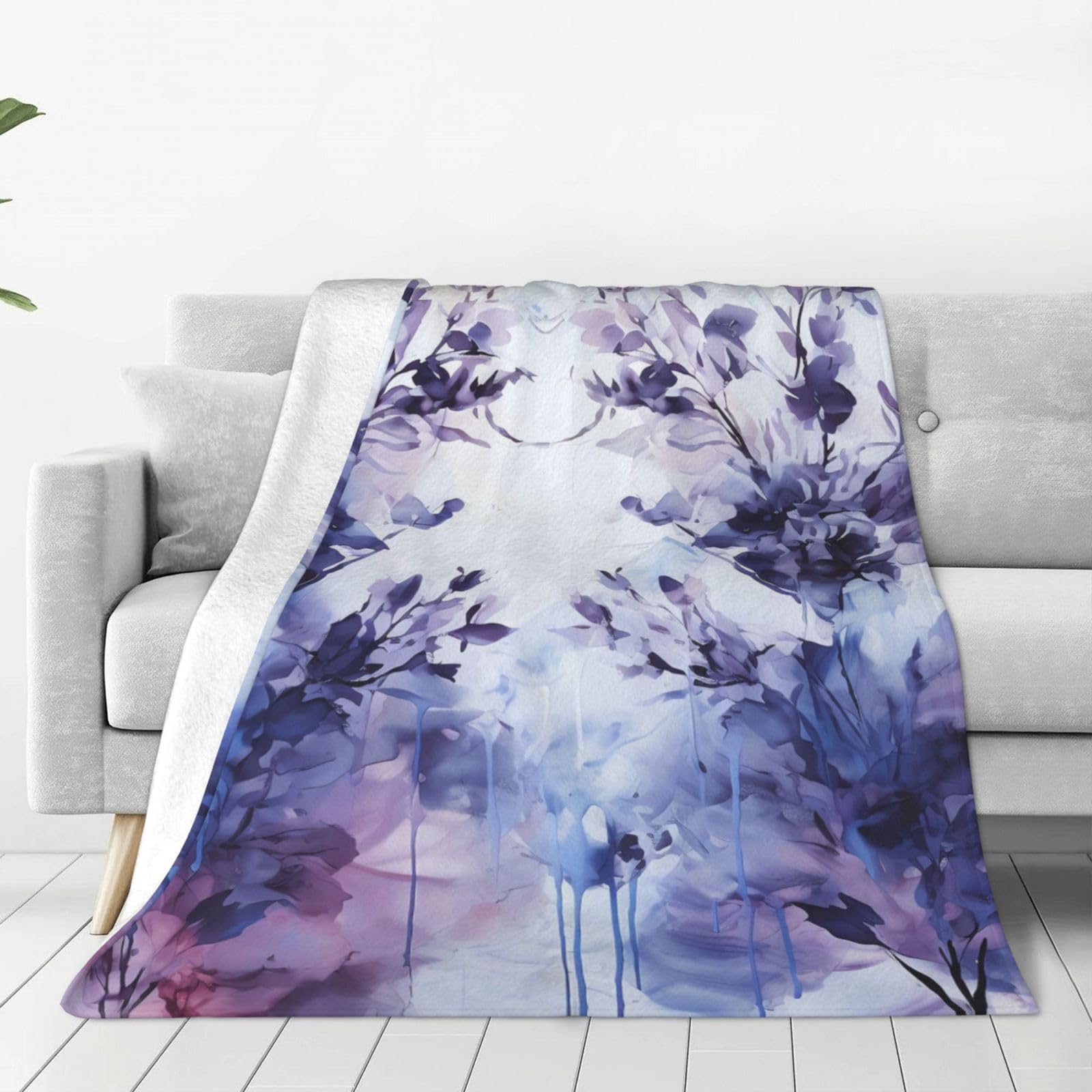 Couverture en micro polaire lavande ultra douce et légère pour rester au chaud sur le canapé
