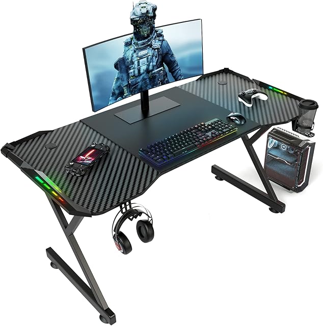 DLONGONE Gaming Desk with LED Lights, Home Office Gamer Desk, Ergonomic Computer Table with Large Carbon Fiber Desktop, 120 cm Office Workstation with Mouse Pad, Cup Holder & Headphone Hook, Black