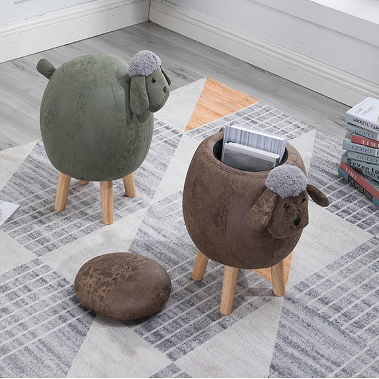 Two animal footstools, one solid and one with an open top revealing a storage compartment filled with books, on a rug in a living room setting.