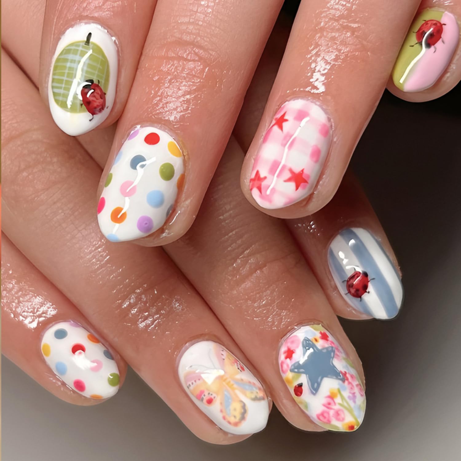 Photo 1 of 24Pcs Spring Summer Press on Nails Short Almond Fake Nails Ladybug Glue on Nails Colorful Polk Dot Butterfly Flower Design Star Strip False Nails Full Cover Acrylic Nail for Women Decor Supplies