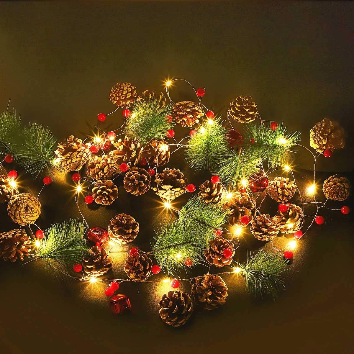 MAOYUE Christmas Garland with Lights, 9.18Ft 30 LED Pre-lit Xmas Garland Lighted Battery Operated with Pine Cones, Berries, Pine Needles, Bells Christmas Decorations for Indoor New Year Wedding Party