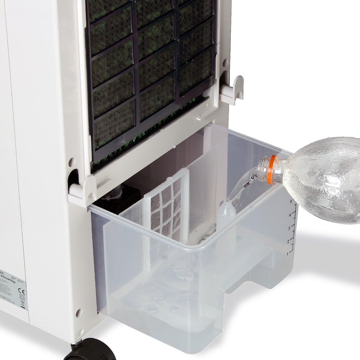 Pouring water into the MONZANA air cooler's tank