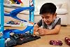 Hot Wheels Exciting Racing Tower Playset Hot Wheels™ city track set HKX43 featuring 1 toy car and Transforming Racing Tower playset