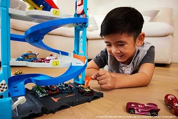 Hot Wheels Exciting Racing Tower Playset Hot Wheels™ city track set HKX43 featuring 1 toy car and Transforming Racing Tower playset