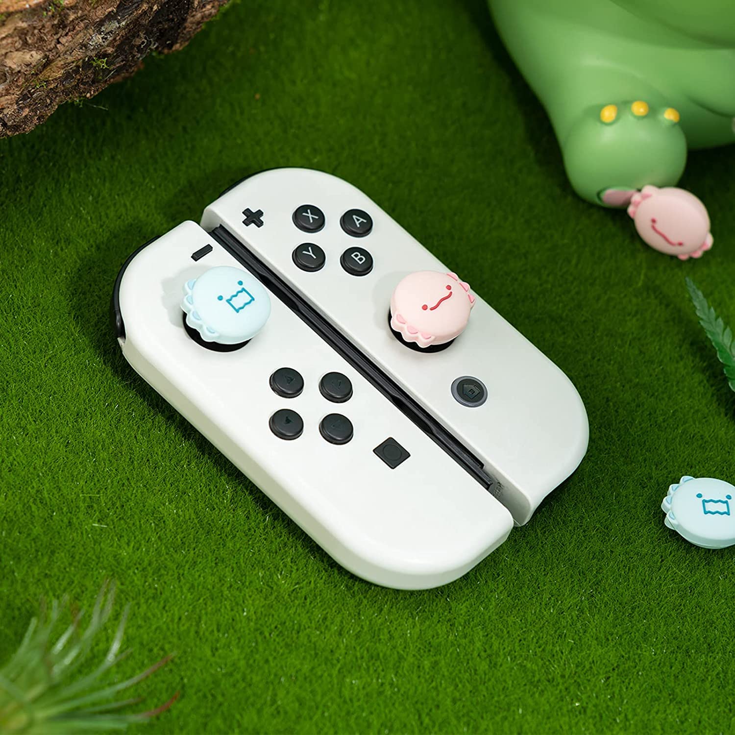 GeekShare Lindas tapas de silicona para el pulgar Joycon, funda para joystick compatible con Nintendo Switch/OLED/Switch Lite, 4 unidades, dinosaurio y ajolote