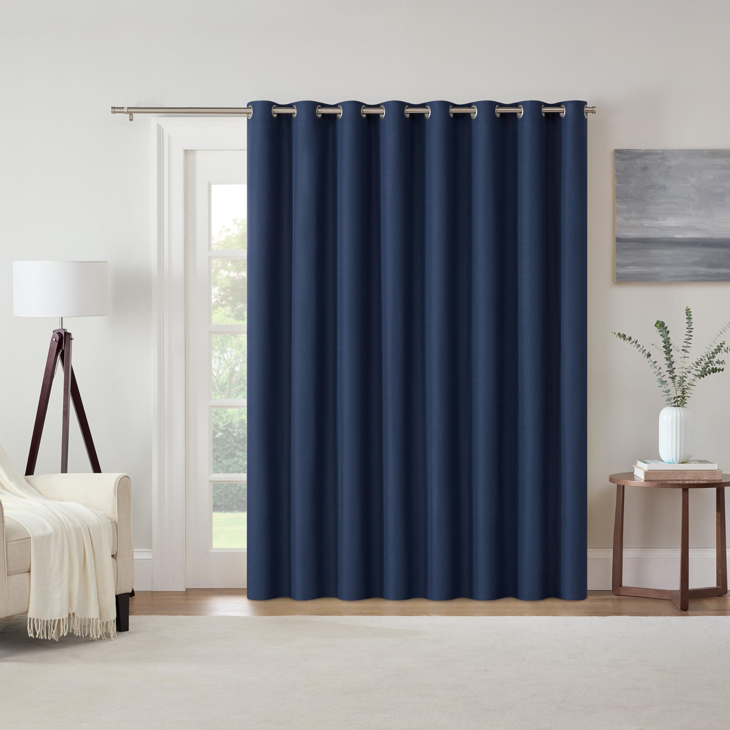Rideau à œillets isolant phonique bleu contre le froid des baies vitrées