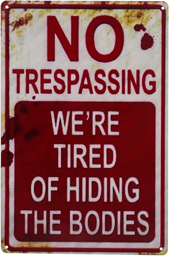 Funny Halloween no trespassing tin sign