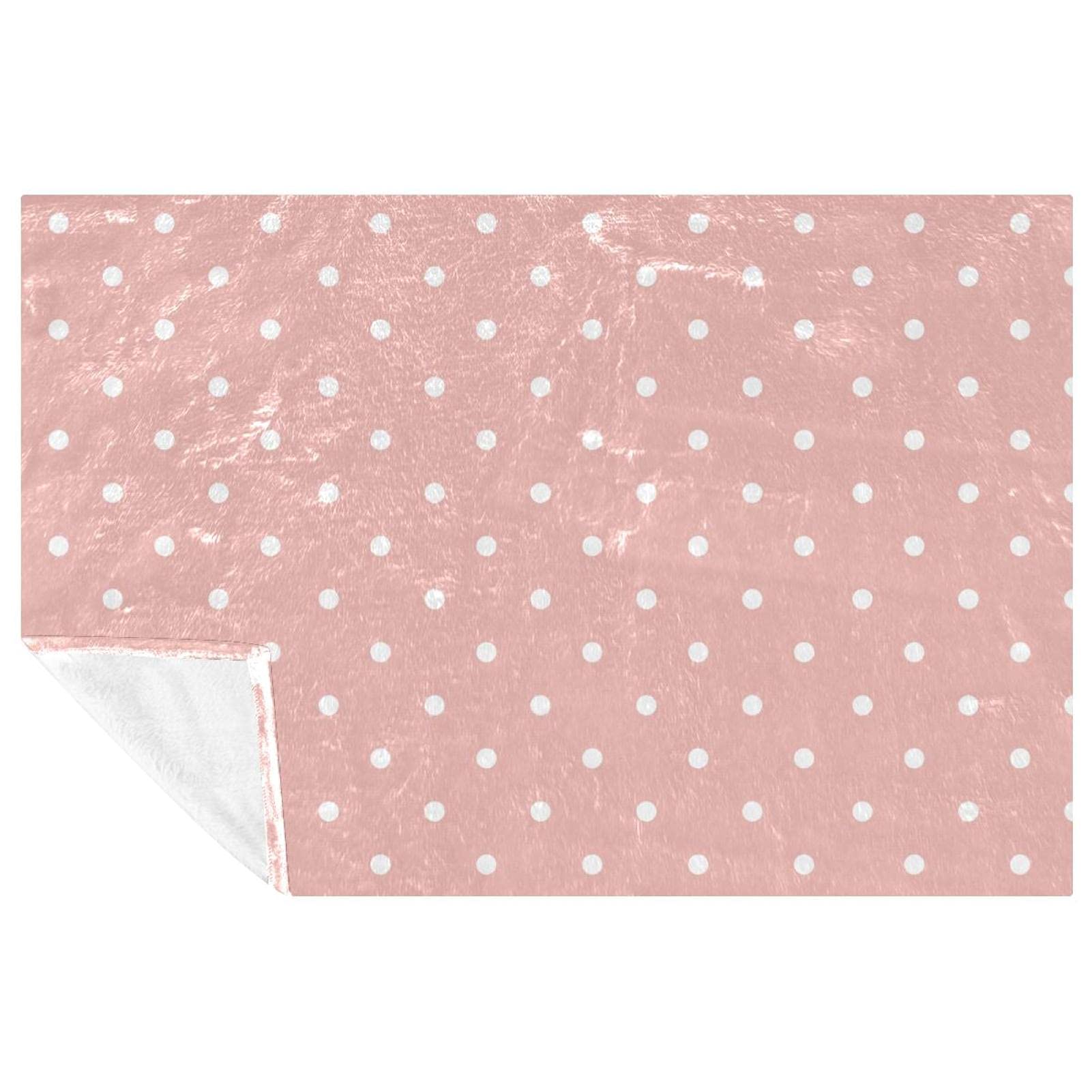Couverture compacte rose à pois : fini le froid en pique-nique ou sur le lit