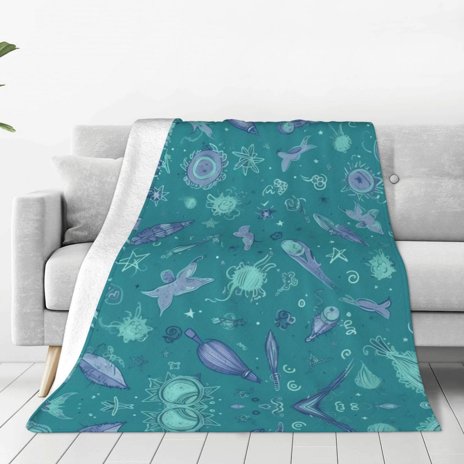 Couverture en micro polaire motif spatial bleu turquoise 152x127 cm