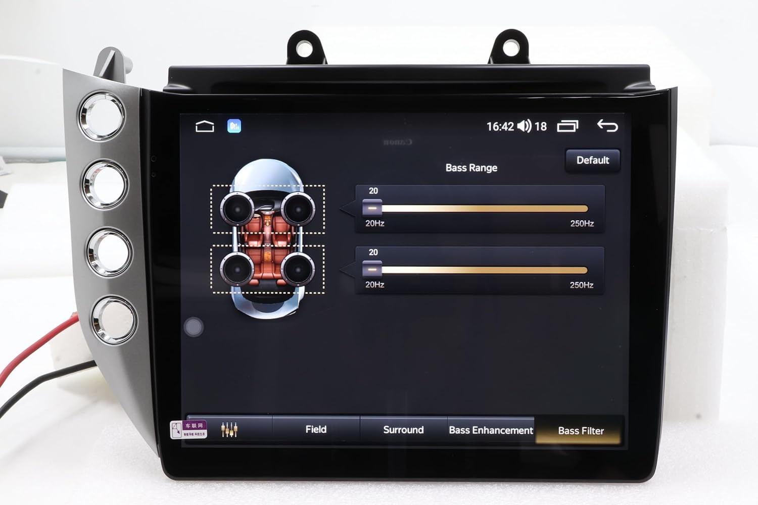 Screenshot of the car stereo's DSP (Digital Sound Processor) settings interface, showing bass range adjustments and options for Field, Surround, Bass Enhancement, and Bass Filter.