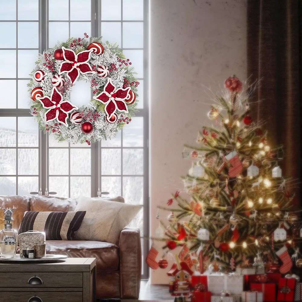 Oairse Corona de Navidad de 24 pulgadas con flor de Pascua roja, adornos de bolas y caramelos, corona artificial grande para decoración de puerta delantera con pino nevado, guirnalda colgante de