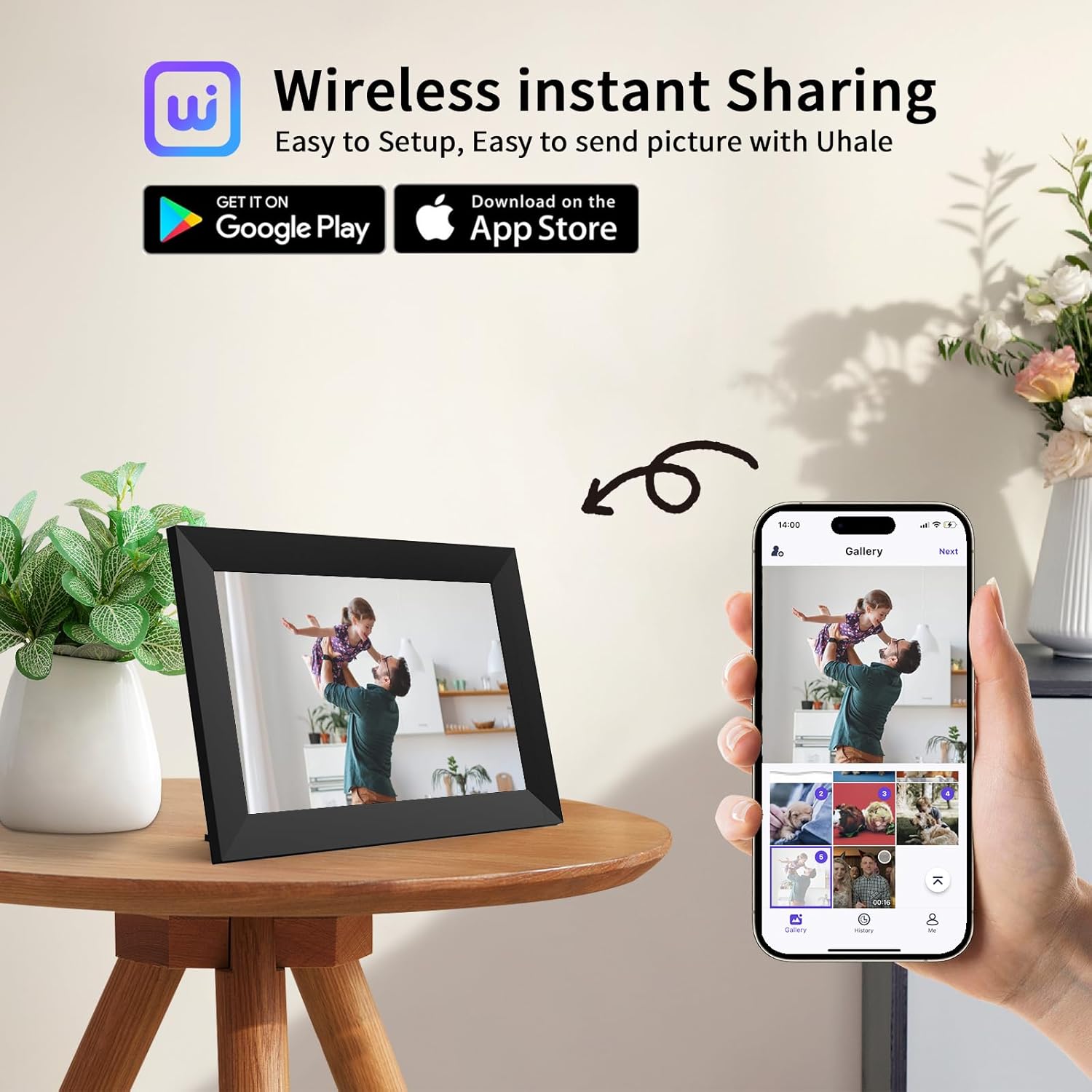 Digital picture frame on a table, with a smartphone showing the Uhale app interface for wireless instant sharing.