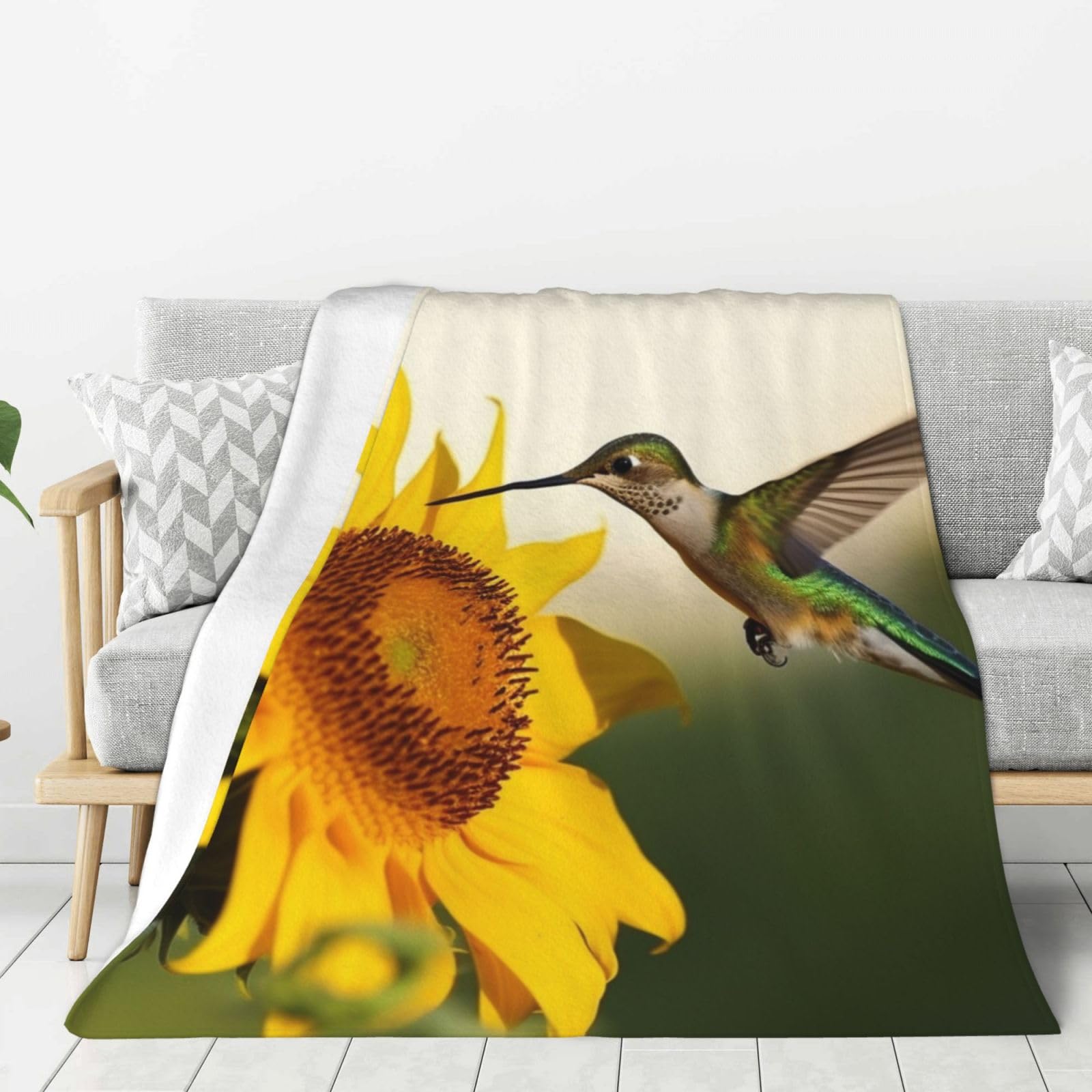 Couverture légère colibri et tournesol idéale pour vos soirées cocooning sur le canapé