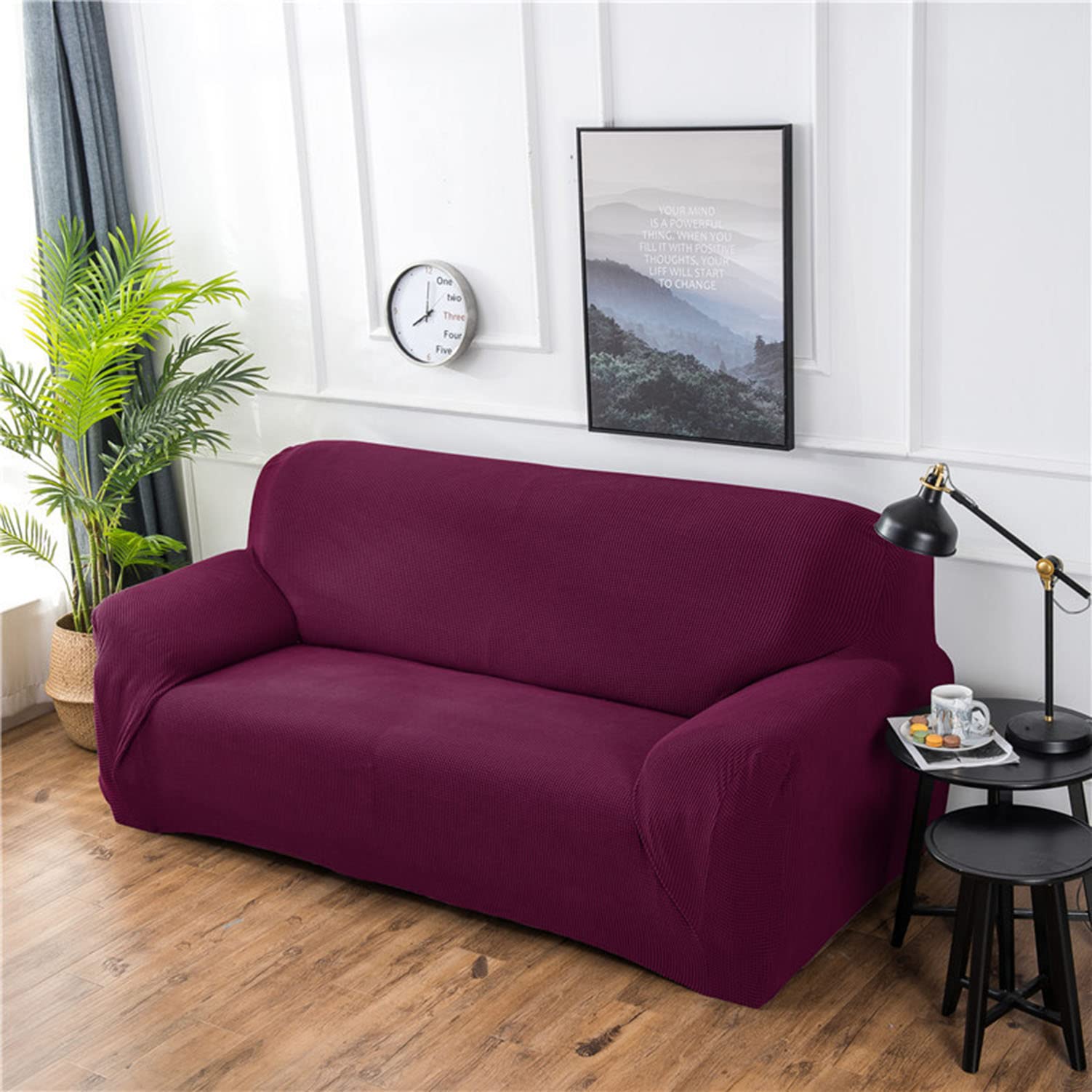 Housse de canapé extensible violette 4 places pour protéger et rénover votre salon