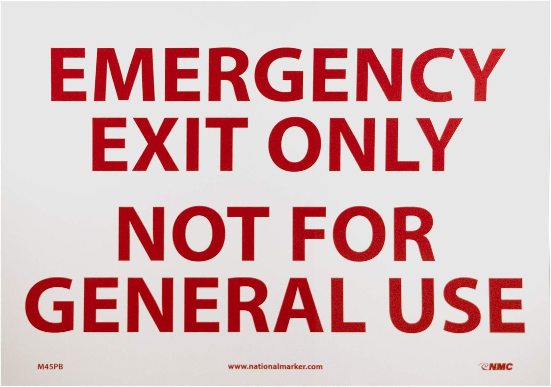 NMC M45PB EMERGENCY EXIT ONLY NOT FOR GENERAL USE Sign – 14 in. x 10in. Adhesive Backed Vinyl Exit Sign with Red Text on White Base