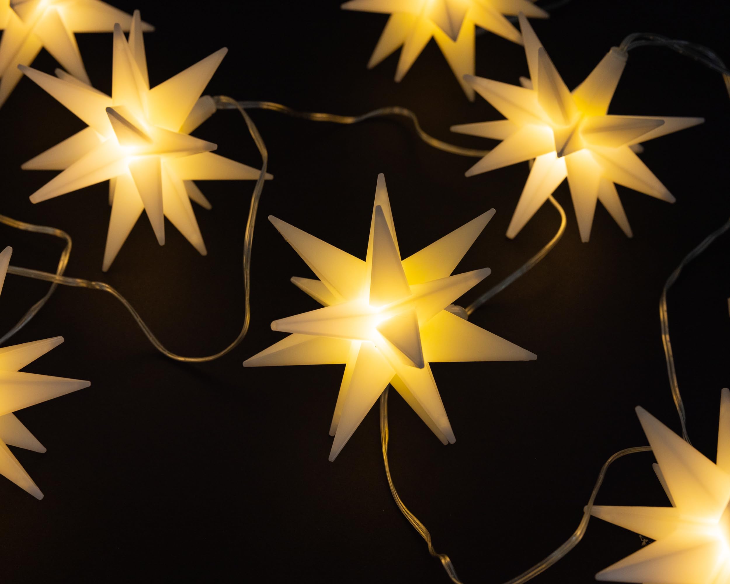 Elf Logic Juego de ocho mini luces LED de 4 pulgadas con forma de estrella morava. Luces de Navidad colgantes al aire libre, decoración de vacaciones, luces de porche, estrellas de Adviento o luces de