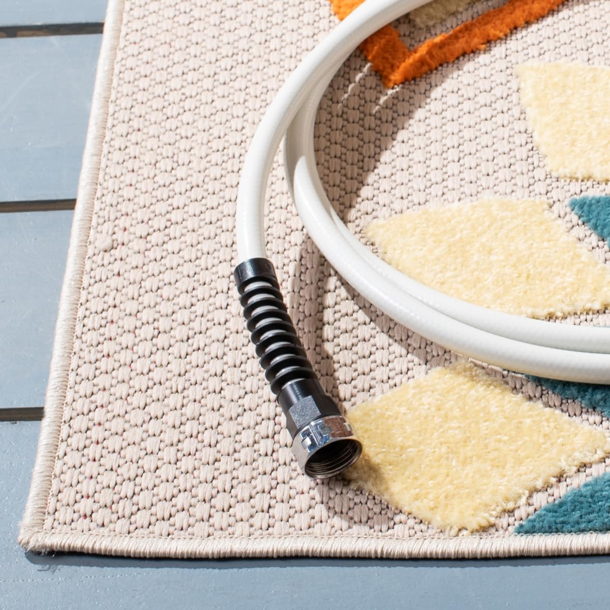 SAFAVIEH Washable Rug Outdoor Cabana Collection - 6'7" x 9', Ivory & Orange, Non-Shedding & Easy to Clean, Ideal for Patio, Backyard, Mudroom (CBN328A)