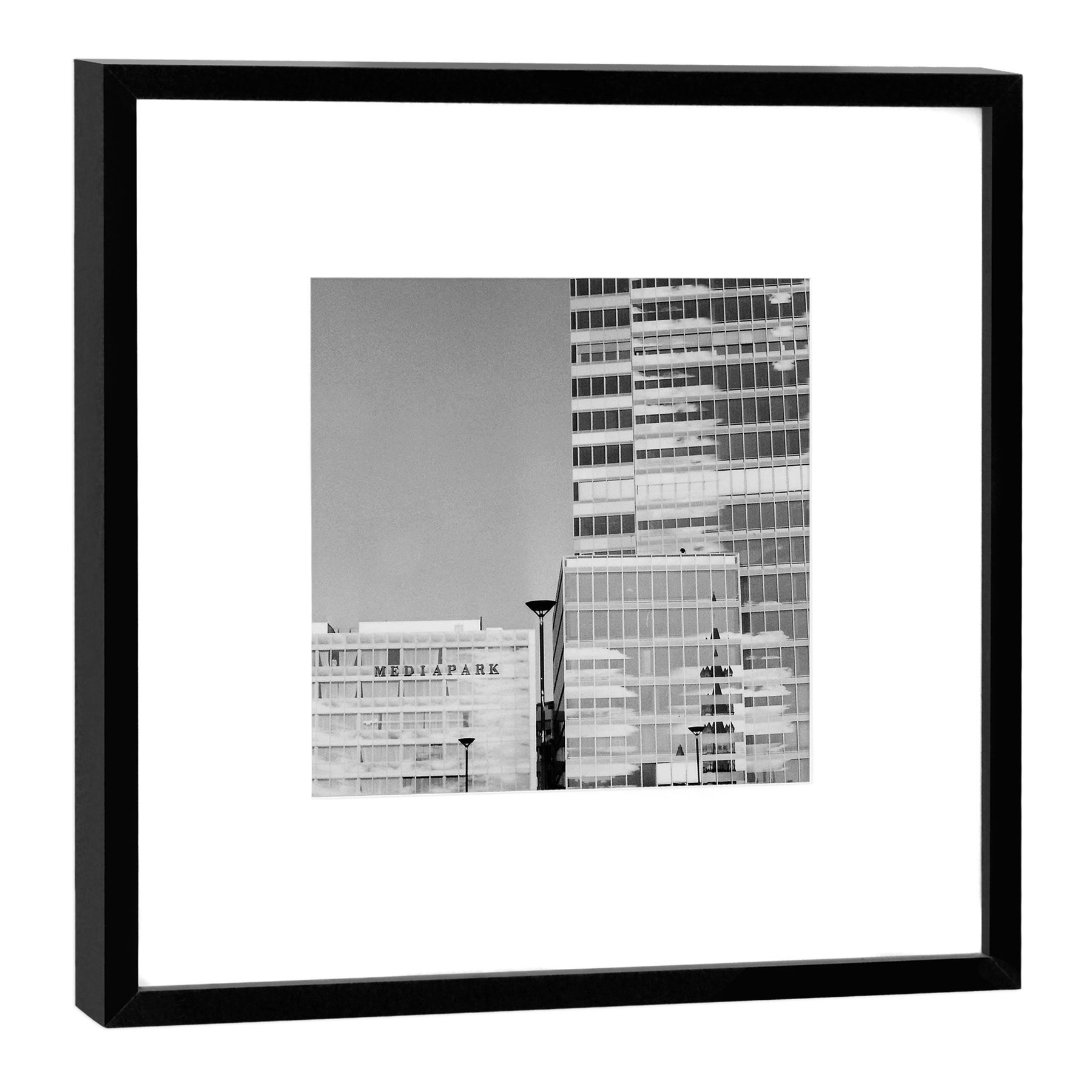 Tableau Tour de Cologne sous cadre noir pour sublimer un salon moderne
