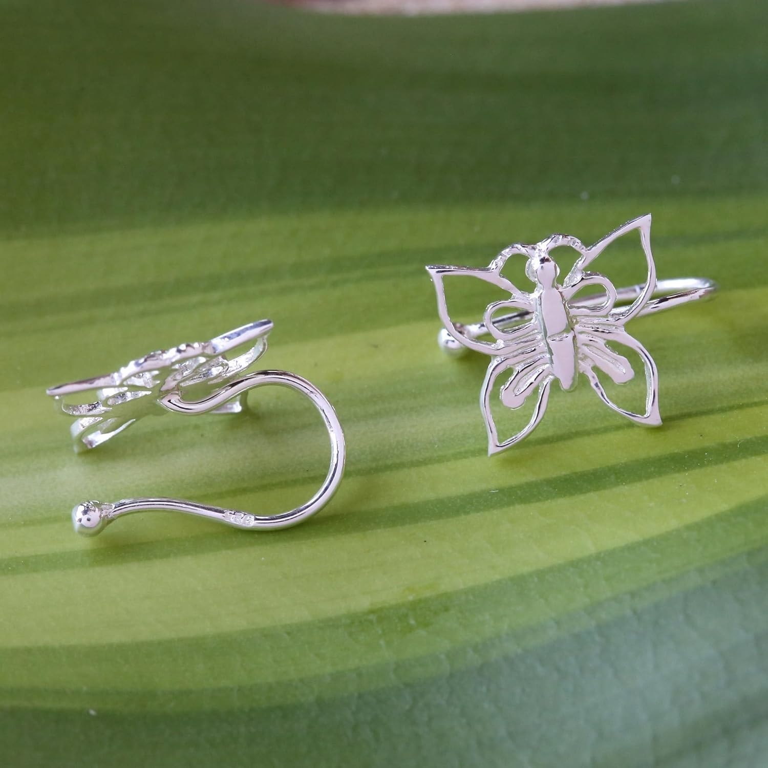 NOVICA Artisan Sterling Silver Ear Cuffs 925 Butterfly Artisan Crafted Thailand Animal Themed [0.4 in L x 0.4 in W] ' Demure Butterflies'